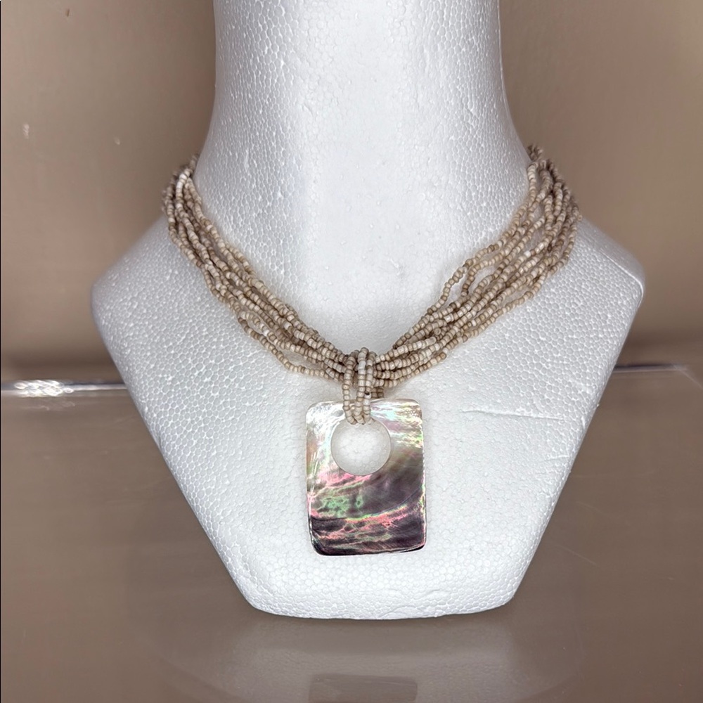 Elegant Cream Multi-Strand Necklace with Cascading Design